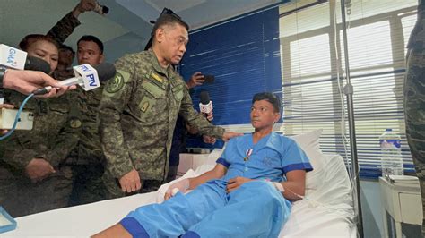 Marcos awards soldier who lost a finger during an encounter with .